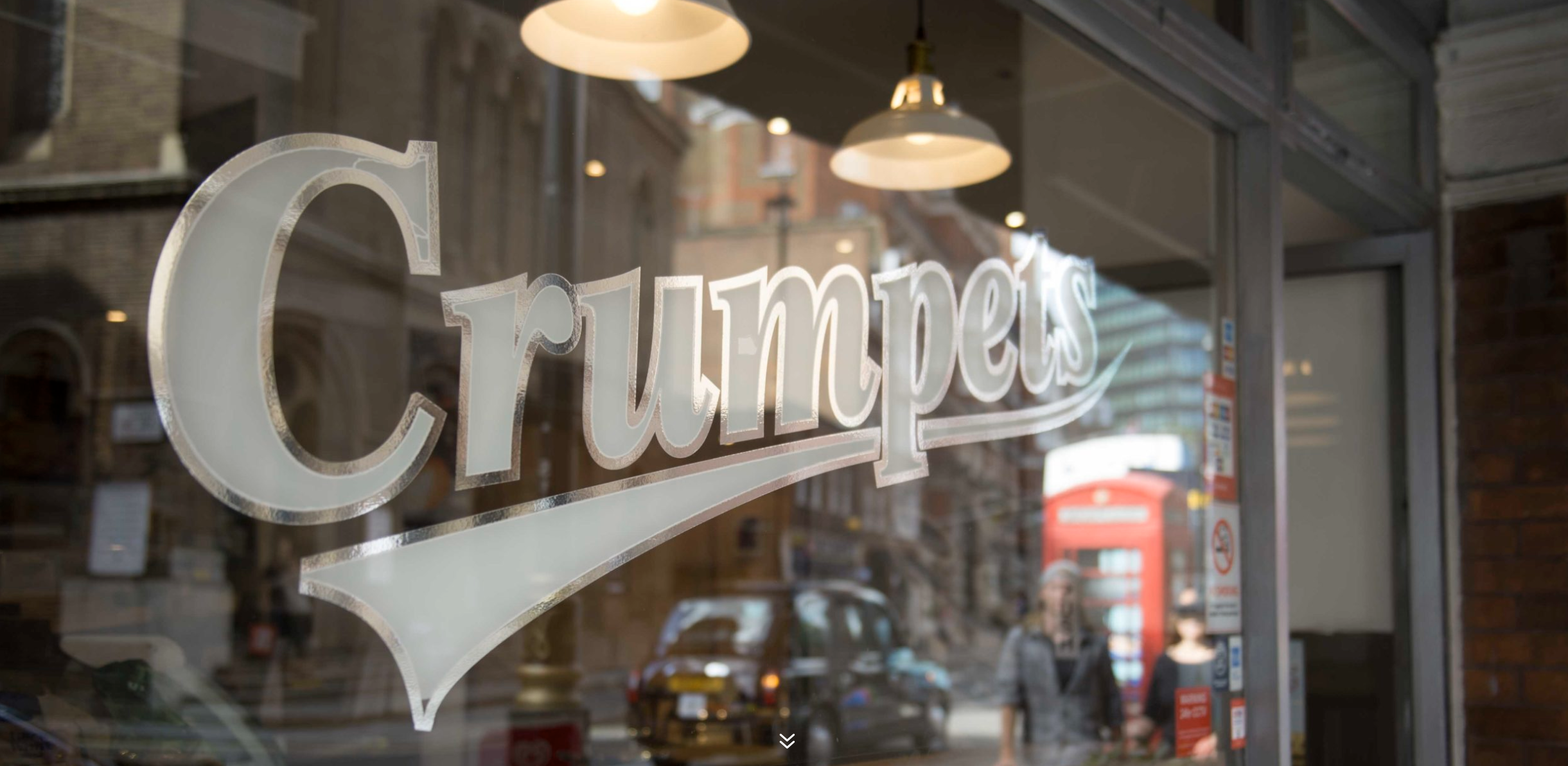 Crumpets Café shop window on Buckingham Gate, London